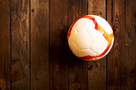 Soccer ball on the wooden background, a Sports & Recreation Photo by photoWorkshop