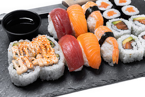 Assorted Sushi Selection and soy sauce on slate tray, a Food & Drink Photo by etorres69