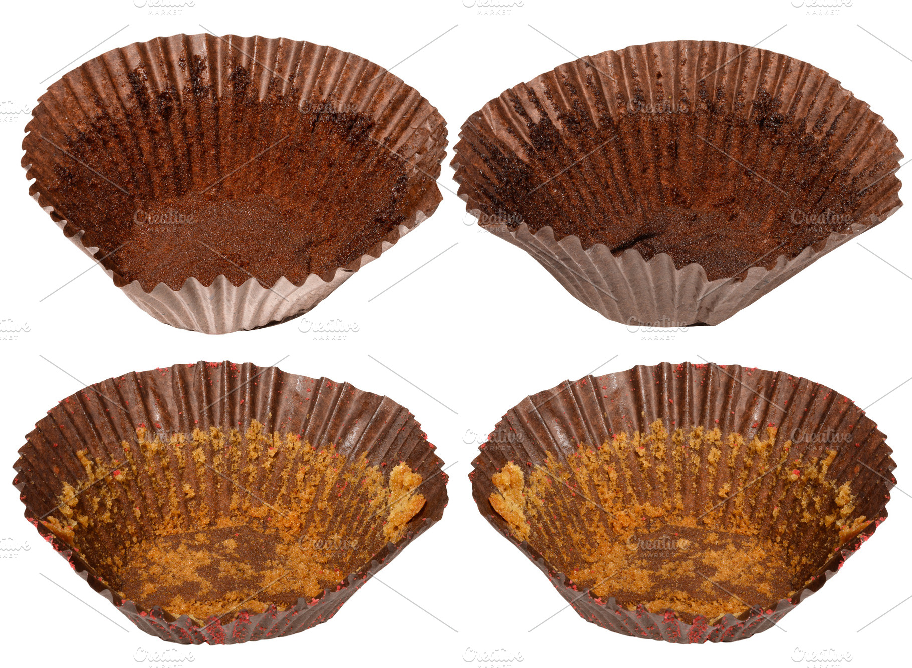 Empty brown paper cupcake or muffin tin with chocolate residue,, a Food & Drink Photo by ndanko
