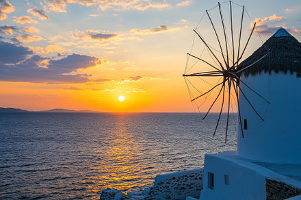 Sunset over Aegean Sea with windmill, a Photo by Iftikhar Alam