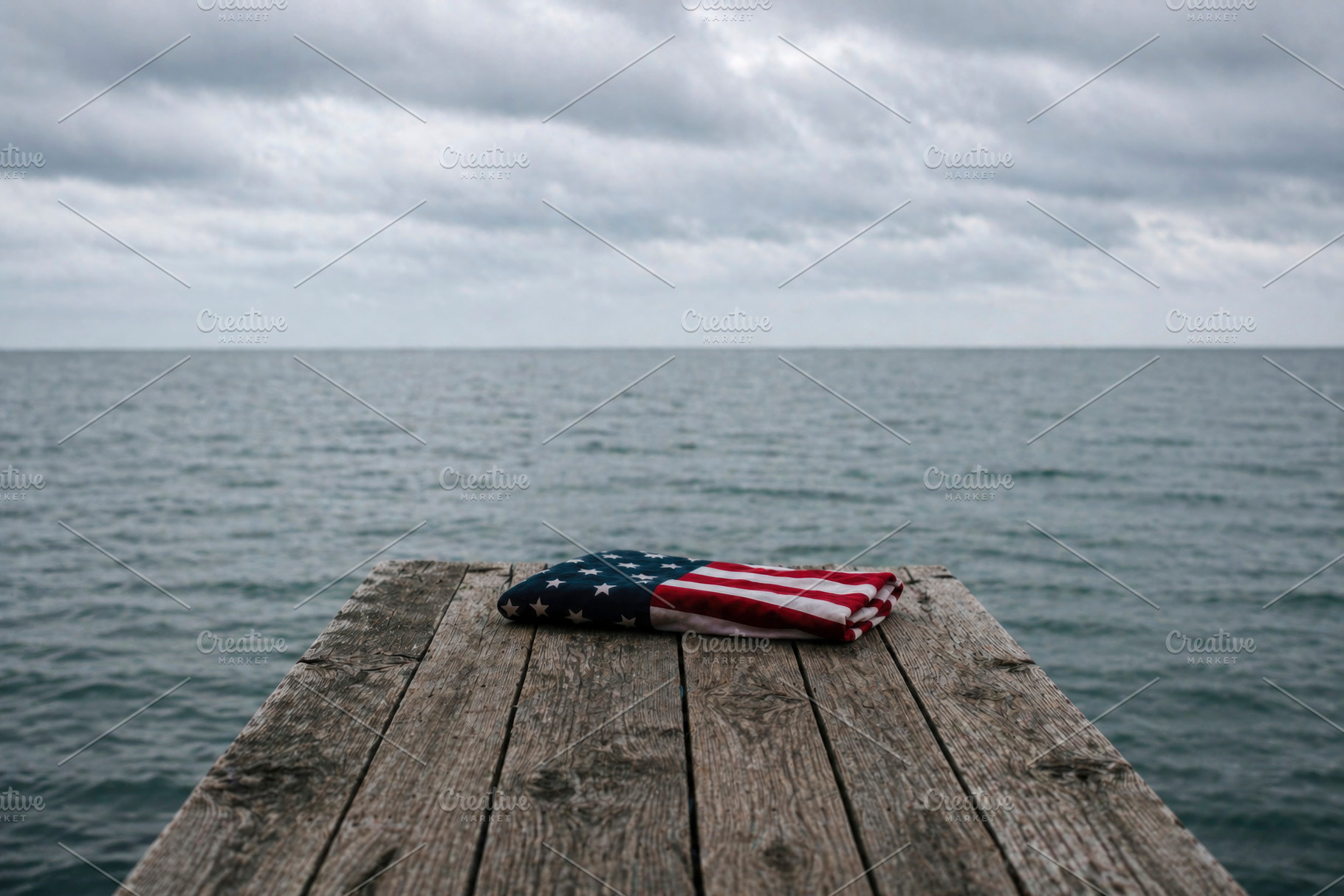 american flag at the end of a pier, generative AI, a Photo by Nito