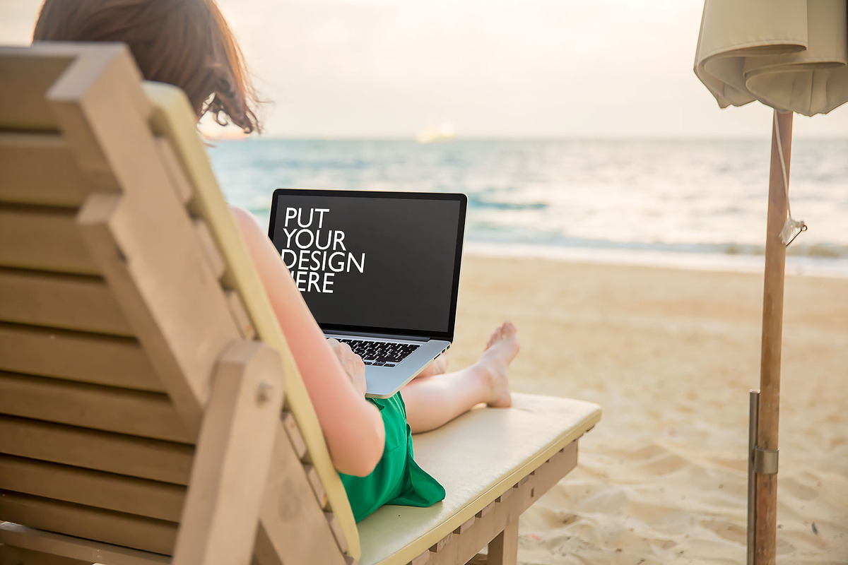 Girl on the Beach with Laptop, a Mac Mockup by UI Kitchen (Photo 4 of 6)