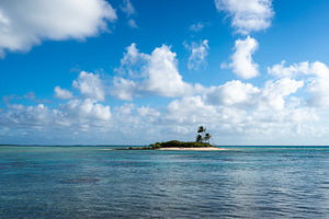Idyllic small motu on Tikehau Atoll, French Polynesia, surrounde, a Nature Photo by GoodGoods