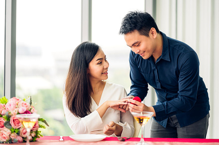 Young handsome romantic asian man giving diamond ring for surpri, a Person Photo by Art_Photo