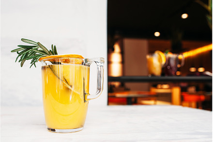 Orange juice with rosemary on cafe, a Food & Drink Photo by Photo Drive Studio