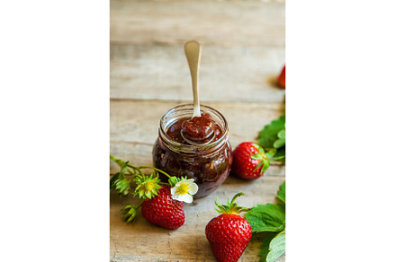 Homemade strawberry jam in a jar, a Food & Drink Photo by yanadjana