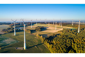 Aerial view of a wind farm in stock photo containing wind and turbine, an Industrial Photo by Leonid Andronov