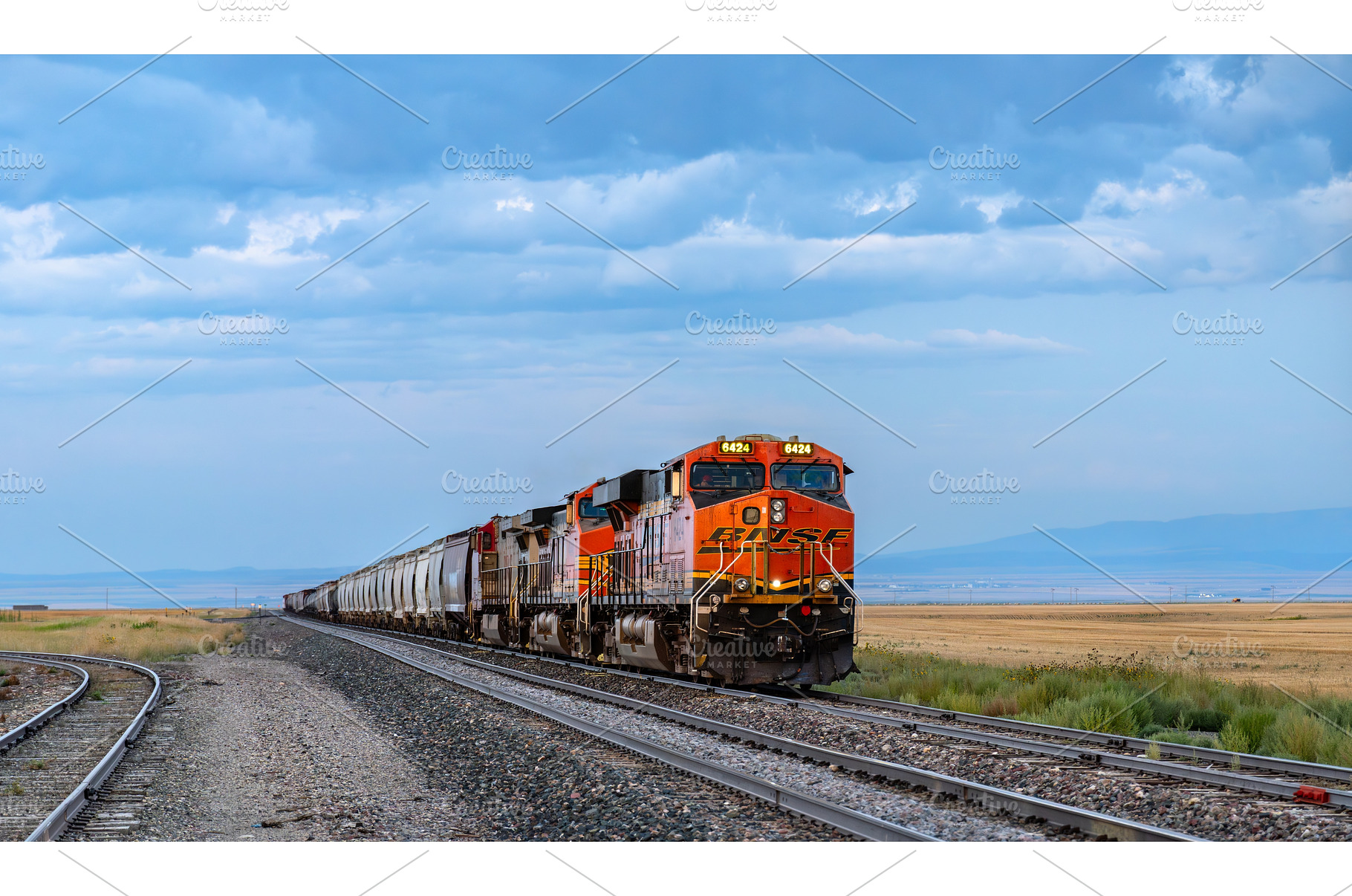 BNSF freight train traveling through, a Transportation Photo by Leonid Andronov