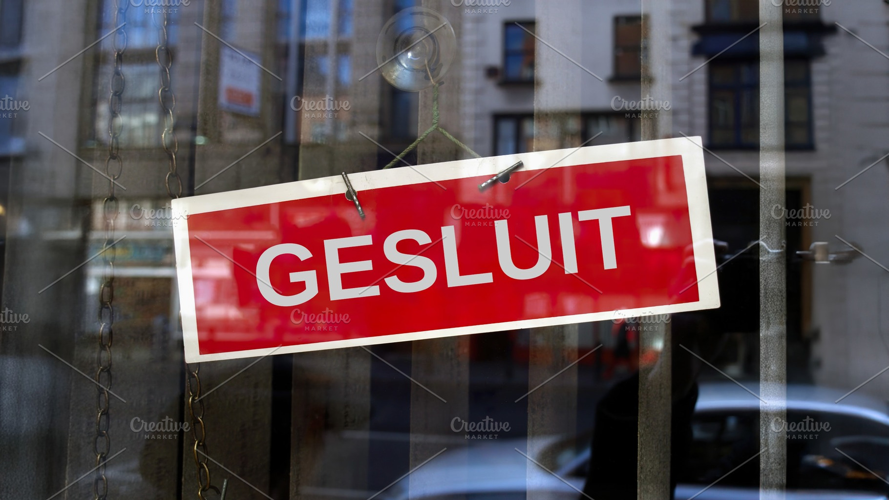 closed sign in Afrikaans, a Photo by WorldPhotos