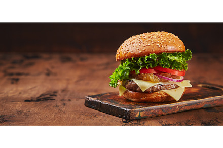 Homemade burger with beef, cheese, a Food & Drink Photo by Irina Burakova