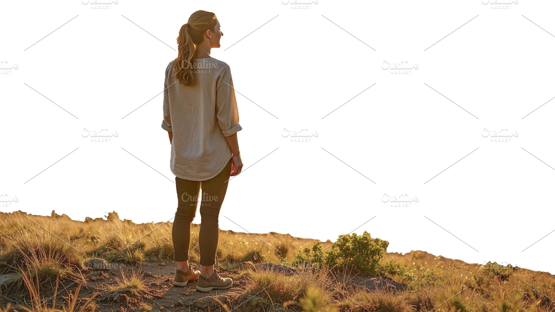 Woman standing alone at sunrise on a hilltop isolated photo, a Person Photo by DanFLCreativo