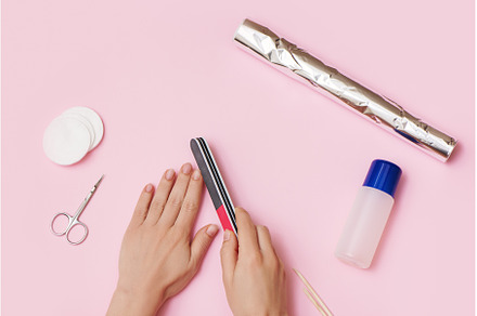 Woman hands removes nail polish on, a Beauty & Fashion Photo by Aliona Serzhanova