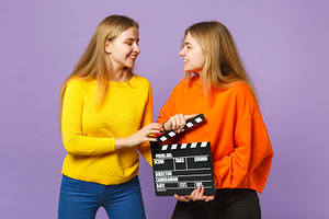 Two smiling young blonde twins siste stock photo containing alike and