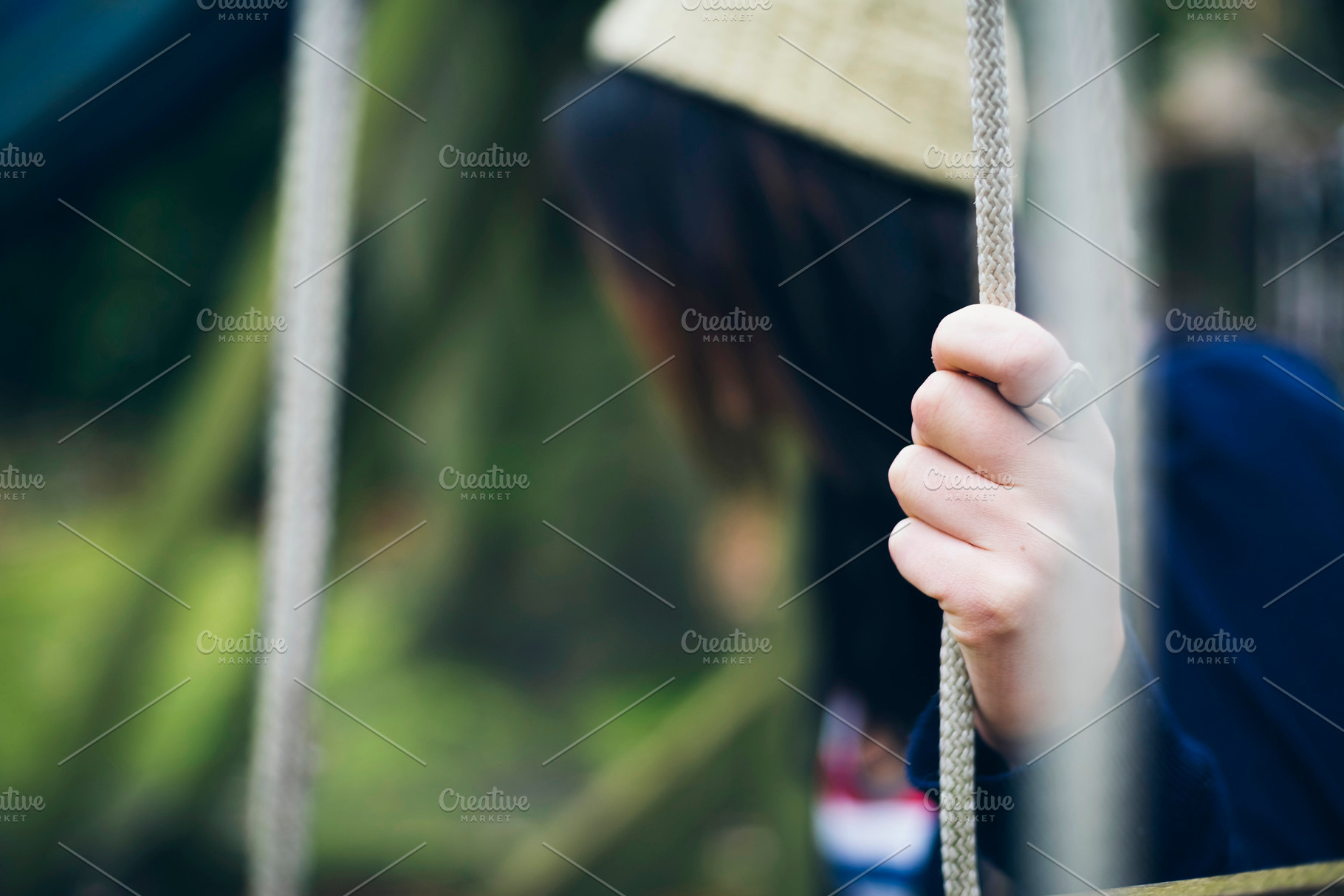 Lonely woman sitting on the swing, a Photo by Simmi Simons