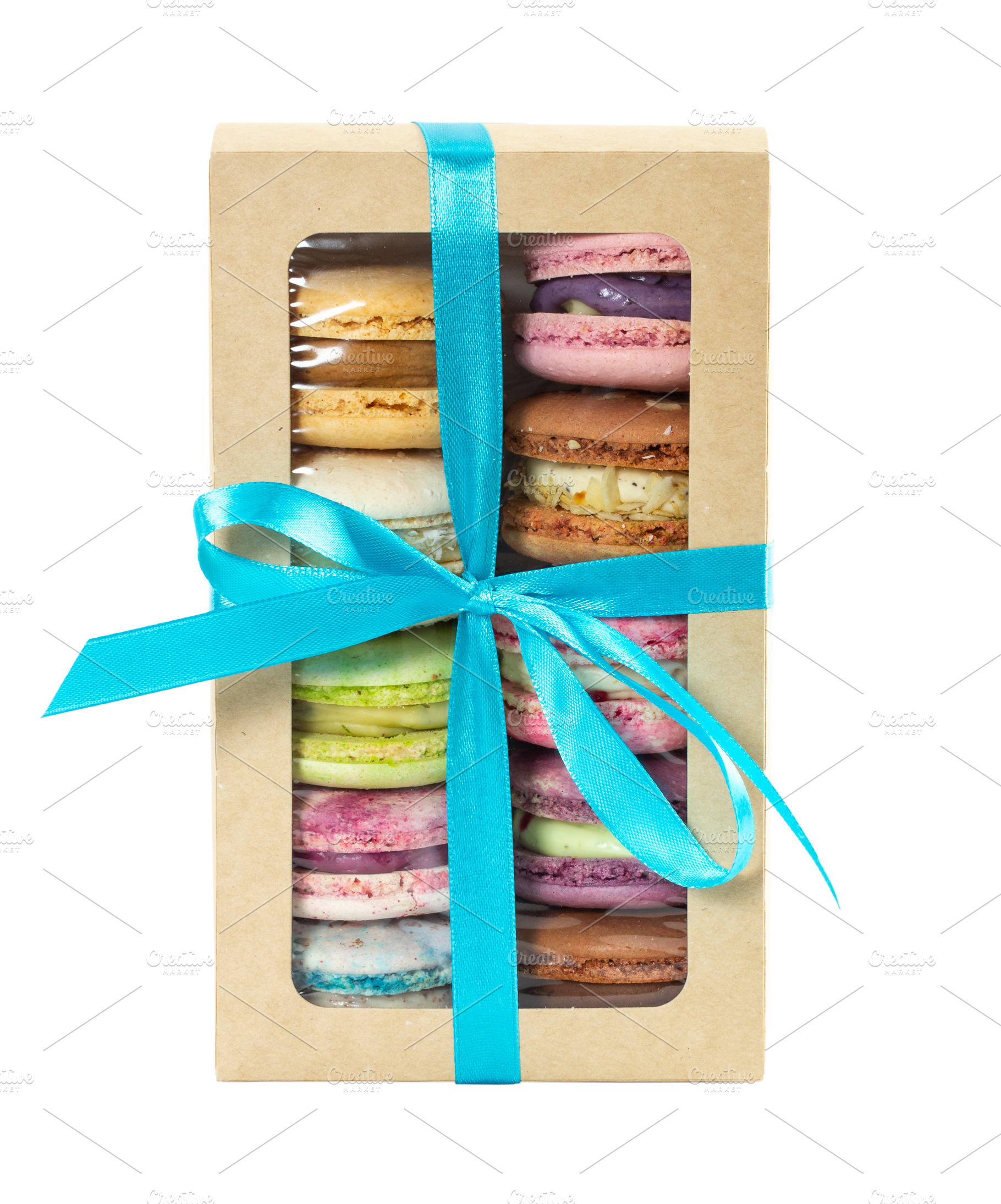 Different colorful macarons in box, a Food & Drink Photo by Nataliia Pyzhova