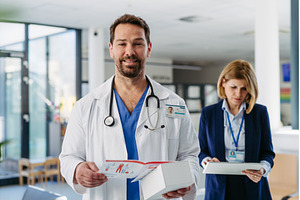 Handsome doctor and pharmaceutical, a Business Photo by HalfPoint