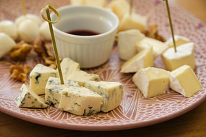 Close-up of cheese platter with blue cheese, camembert, mozzarella and walnuts., a Food & Drink Photo by Rohan Photography