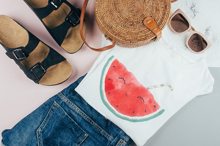 Summer women's clothing, accessories. T-shirt, denim shorts, organic rattan bag, a Beauty & Fashion Photo by Anikona