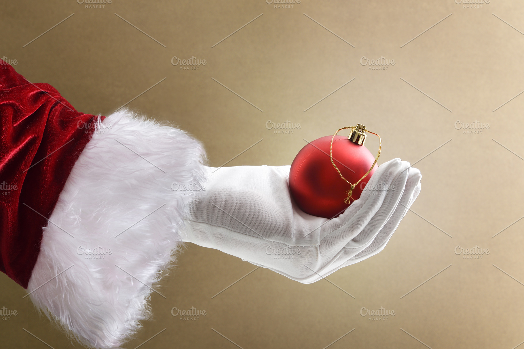 Background with Santa's hand holding Christmas decorative ball i, a Holiday Photo by Davizro's Market