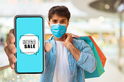 Man Showing Smartphone Advertising Sale Offer Shopping In Hypermarket, a Photo by Prostock-Studio (Thumbnail 1 of 3)