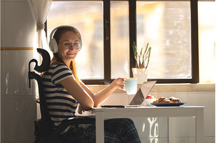 Smiling adult woman in headphones, a Person Photo by Barcelona_dreams