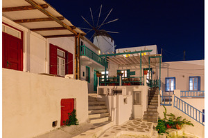 Traditional houses and windmill in, an Architecture Photo by kavalenkava
