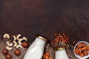 Nut milk in glass bottles stock photo containing milk and vegan