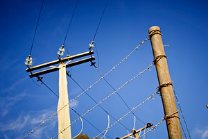 Barbed Wire Power Line, an Industrial Photo by THP Creative