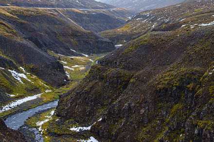 Autumn overcast day in the north of Iceland. Small river flowing, a Nature Photo by YuriyB