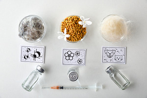 Background with various allergens with vaccines syringe and post, a Health & Medical Photo by Davizro's Market