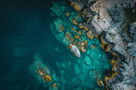 Turquoise waters showcase an intrica, a Photo by Tanuart