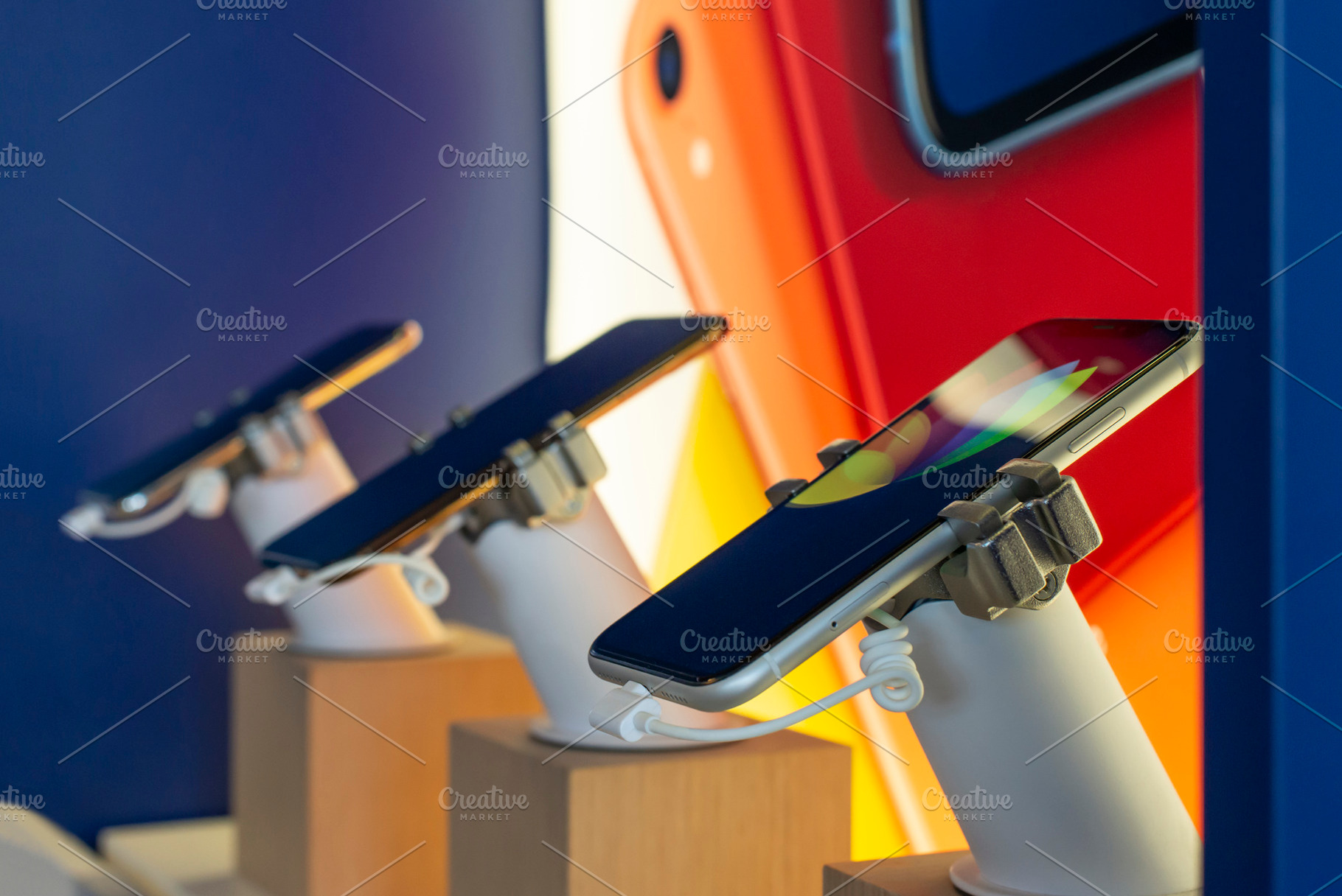 Cell phones on shelf in telecommunic featuring smartphone, cellphone, and, a Technology Photo by Deyan Georgiev