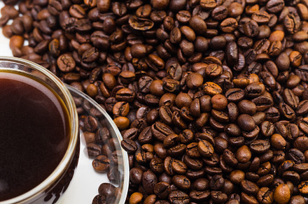 Black coffee in a glass cup and grai stock photo containing cup and coffee, a Food & Drink Photo by oleghz