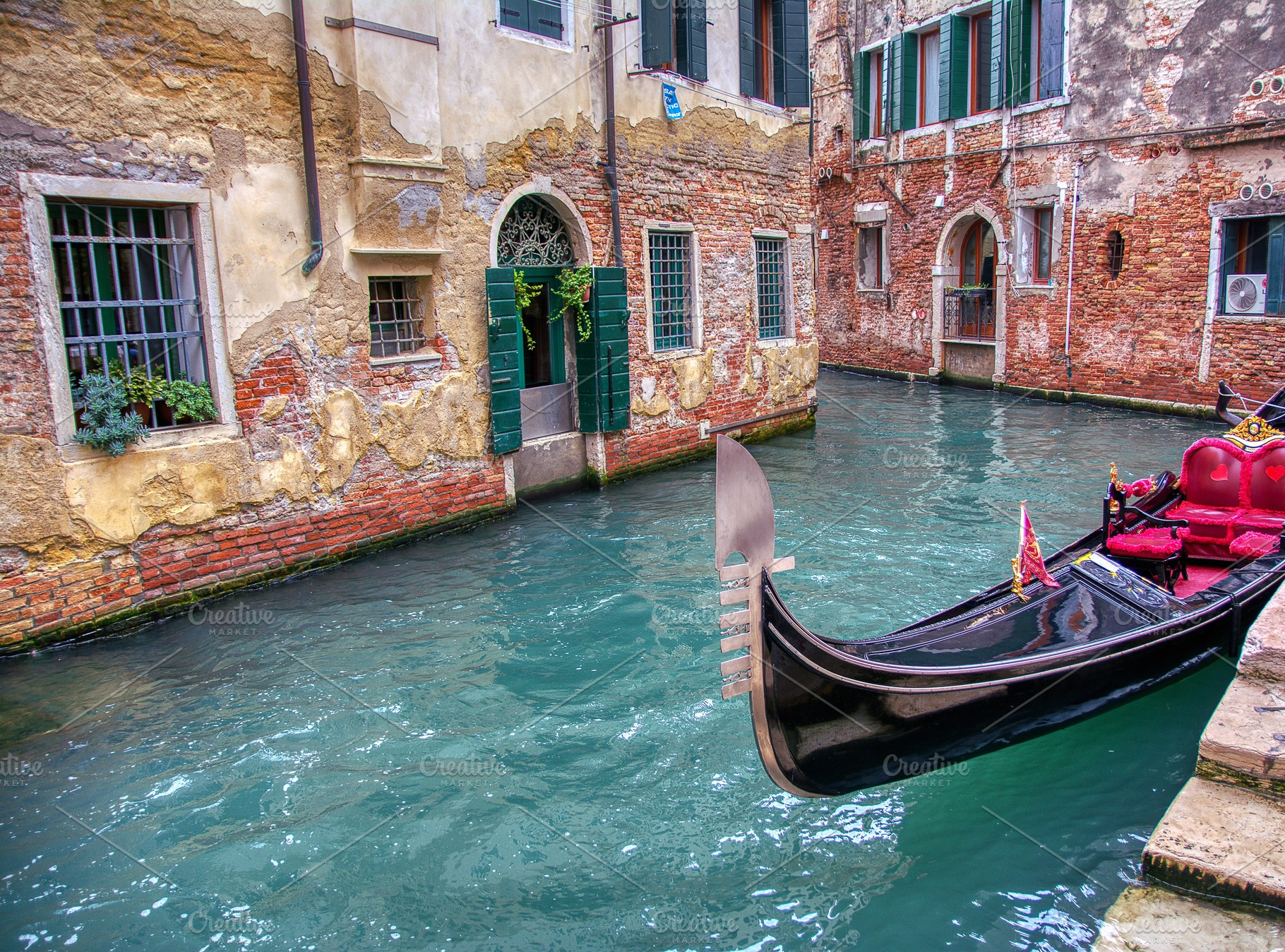 Gondola sailing through a canal in v containing venice, gondola, and famous, a Holiday Photo by CreativePhotoSpain