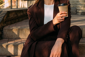 Successful woman portrait coffee break moment, a Person Photo by Photo Drive Studio