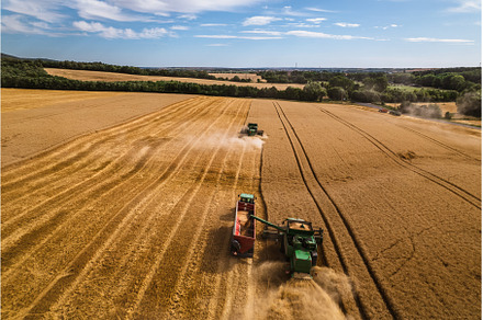 Aerial view of a tractor and, an Industrial Photo by HalfPoint
