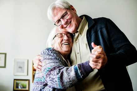 Senior couple dancing containing adult, american, and assisted living