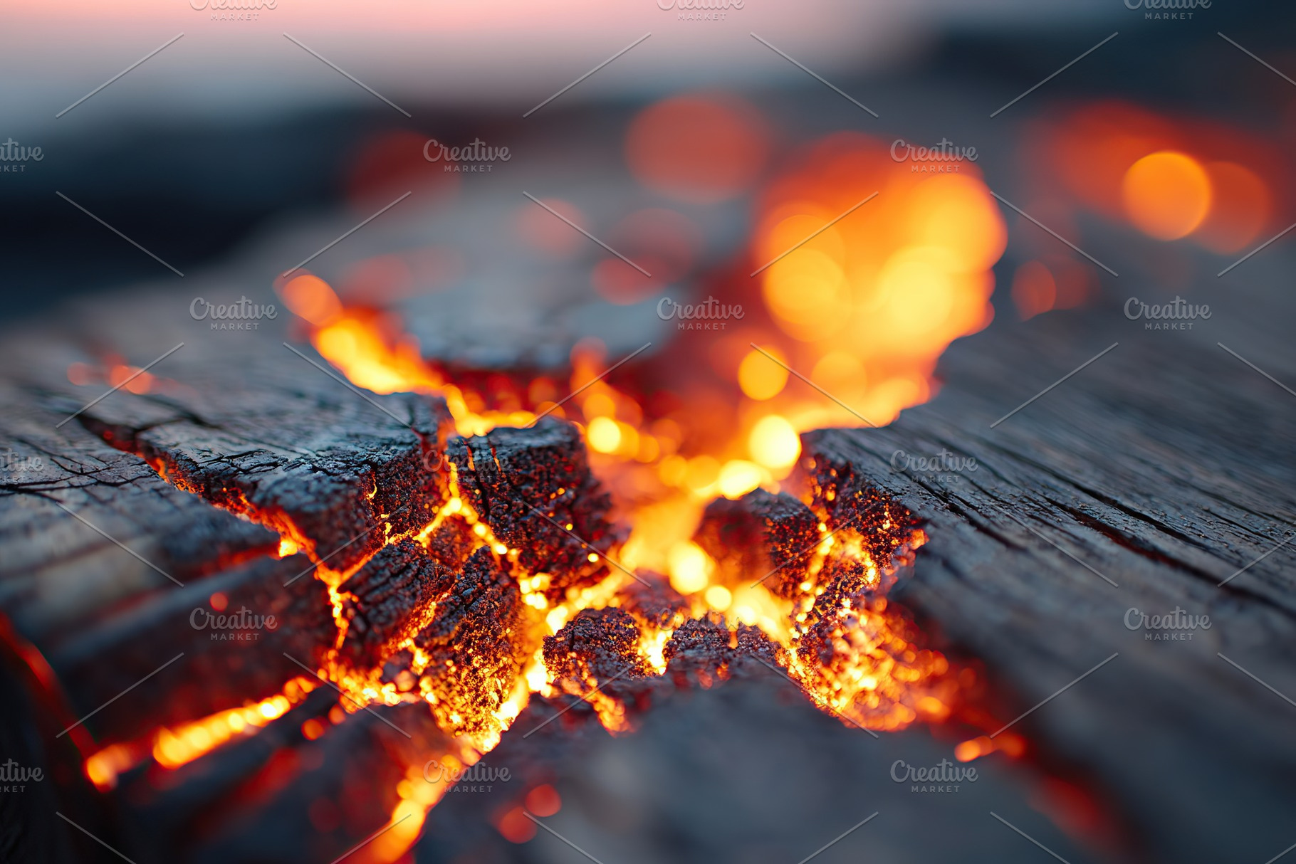 Close-up macro view of glowing charred wood revealing intricate patterns and te, an Arts & Entertainment Photo by AlyaAnd
