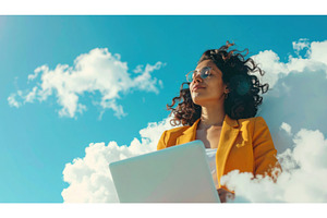 A woman in a yellow blazer working, a Technology Photo by Igor Tichonow