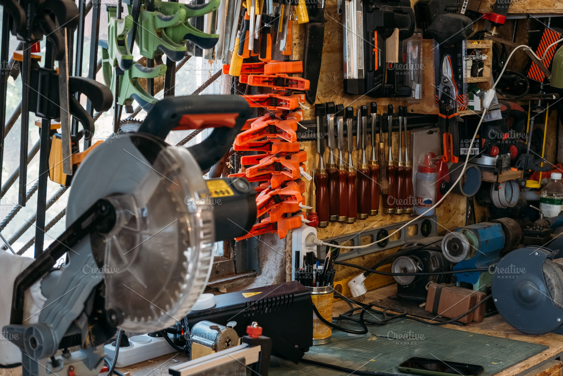 Workshop tools wall carpentry equipment collection, an Industrial Photo by Photo Drive Studio