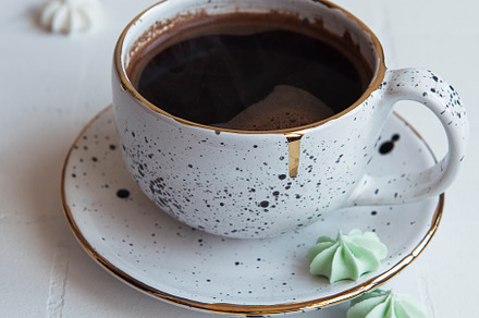 Cup with coffee and small meringues, a Food & Drink Photo by Olena Rudo