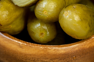 small, crispy green cucumbers salted with spices, a Photo by rsoollAI