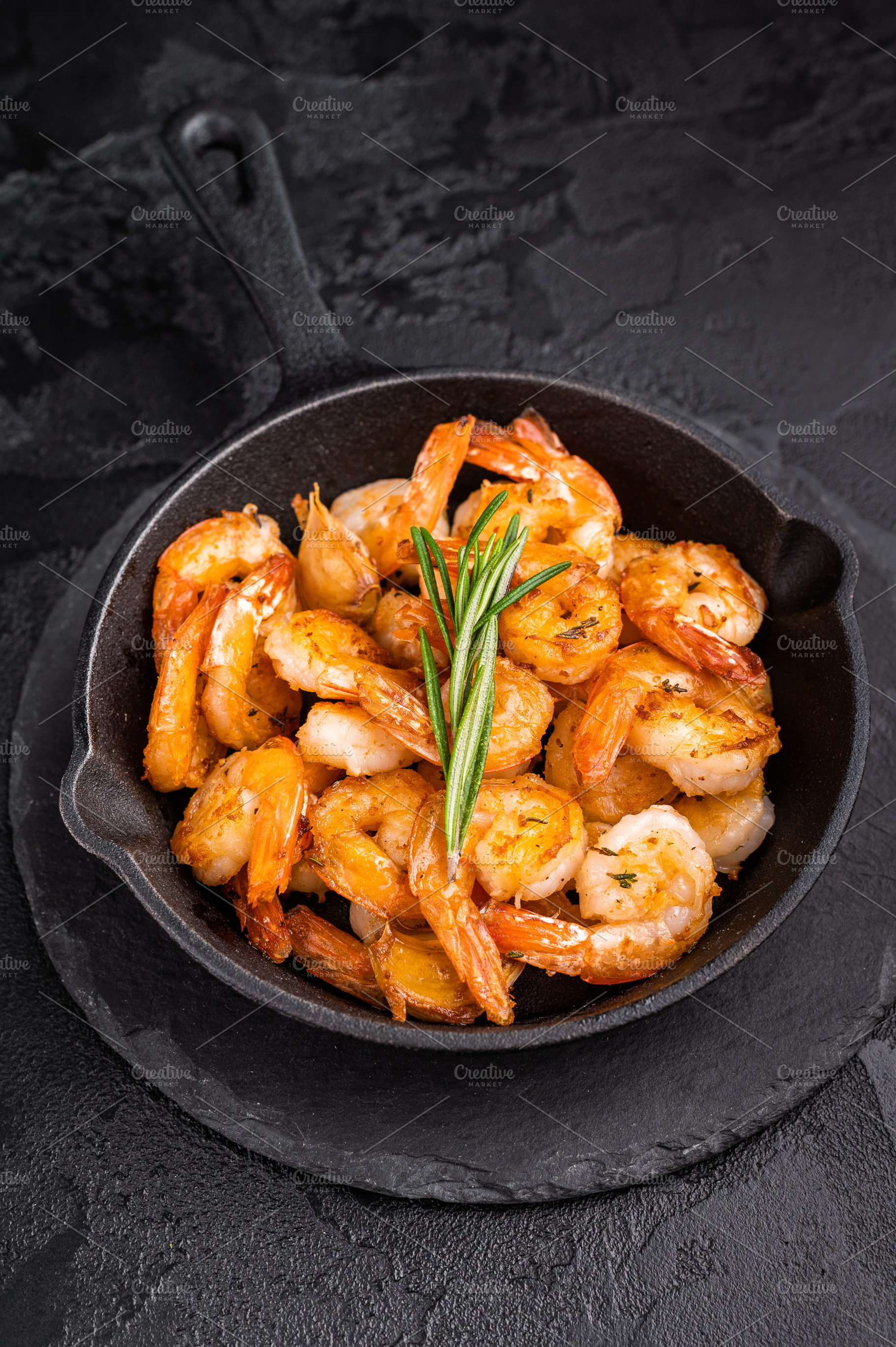 Close up of juicy grilled prawns garnished with herbs, a delicio, a Food & Drink Photo by composter-box@mail.ru