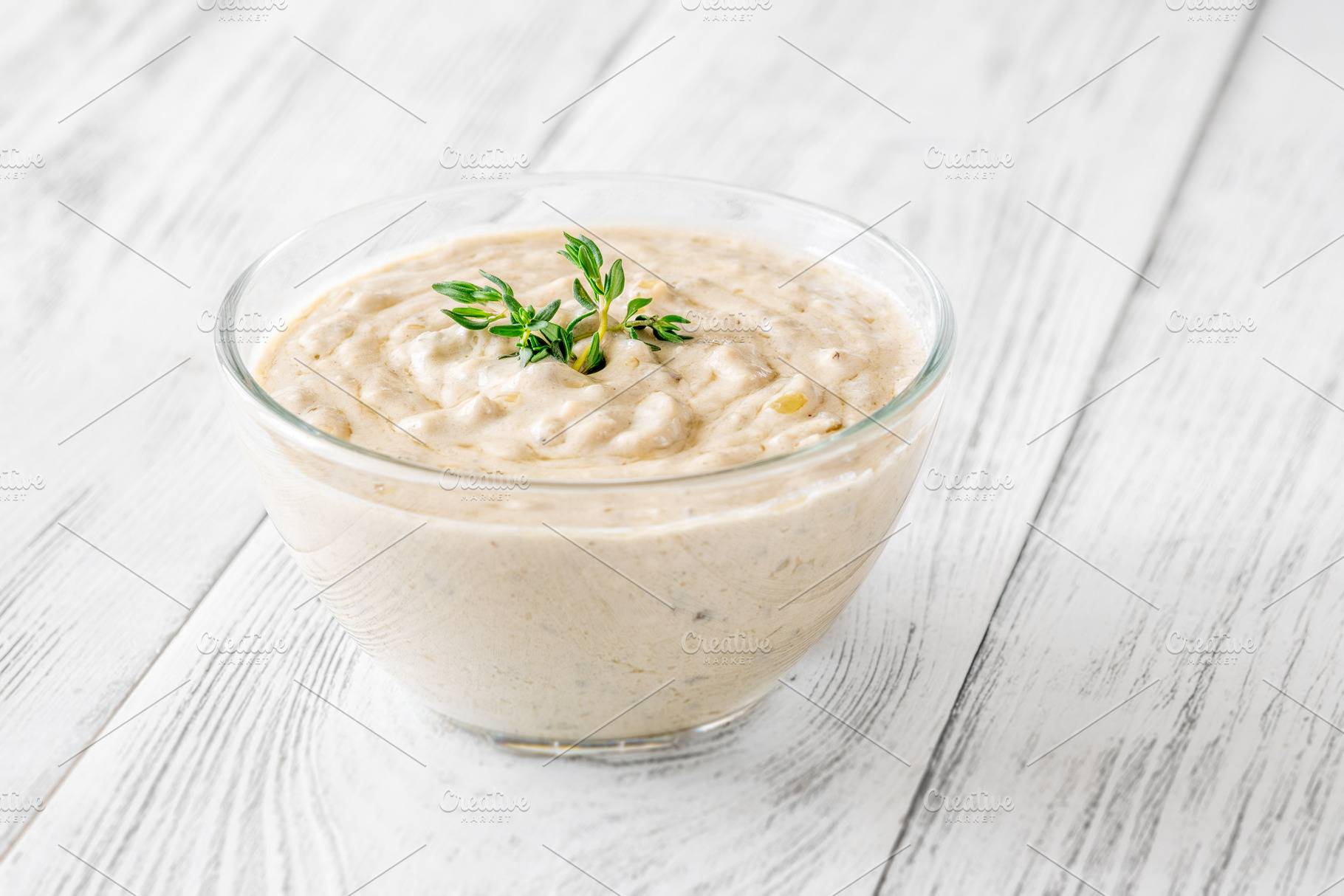 Creamy blue cheese sauce garnished w, a Food & Drink Photo by Alexander Prokopenko