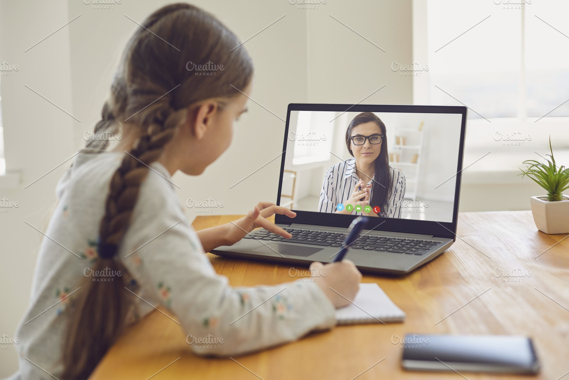 Online education of children girl stock photo containing online and education, a School & Education Photo by StudioRomantic