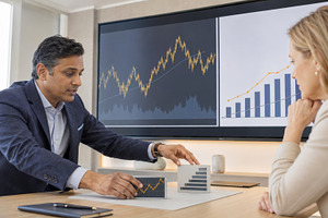 Financial analysts review bond marke, a Photo by Dvoevnore photos