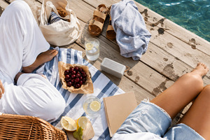 Relaxing dockside summer picnic with, a Photo by Dvoevnore photos