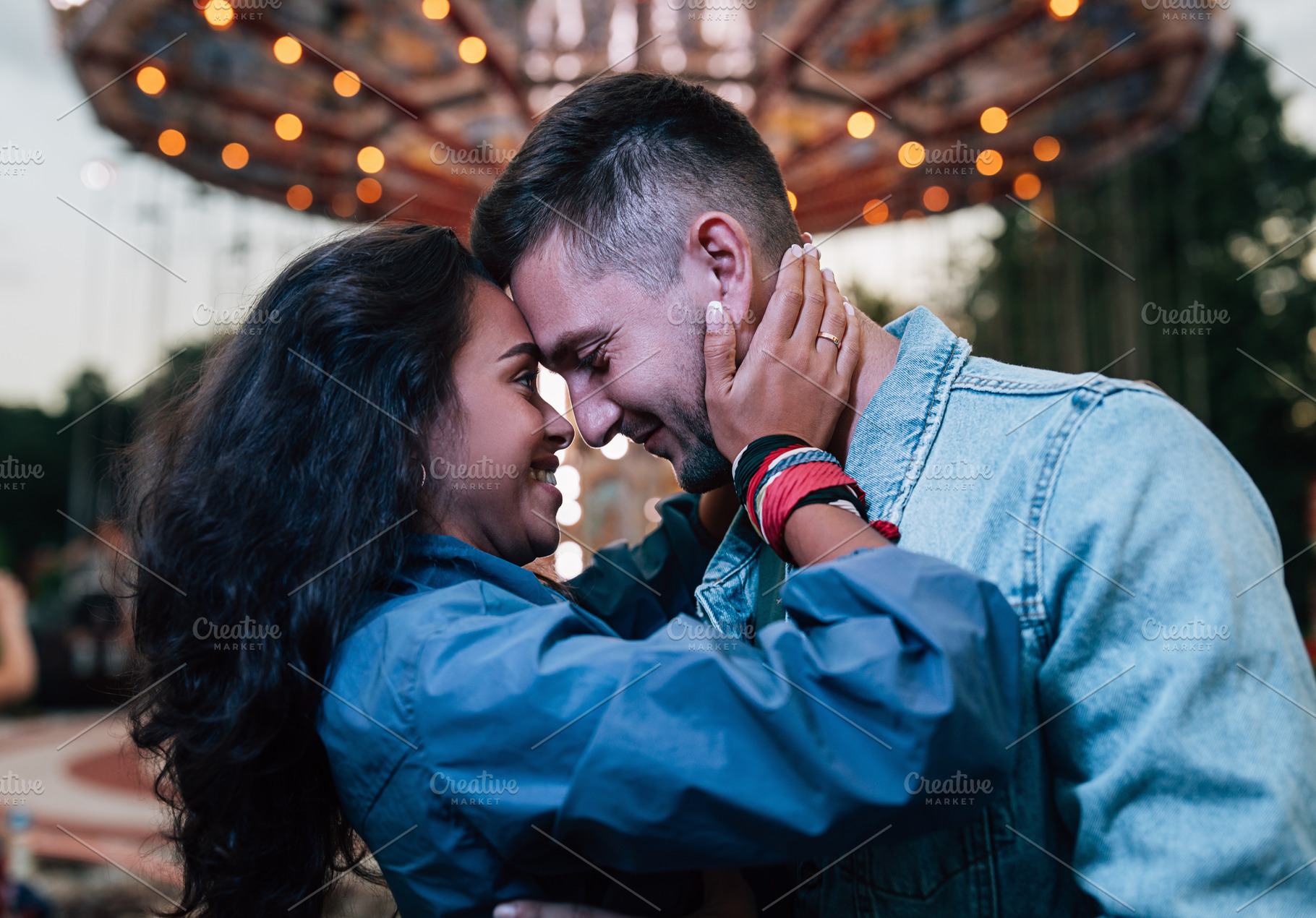 Smiling couple embracing at night, a Person Photo by Artem Varnitsin