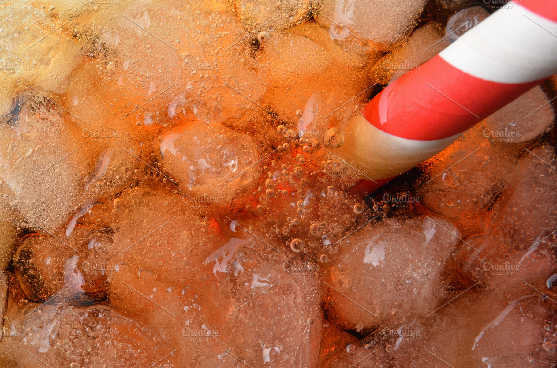 Macro of a refreshing drink with ice and a straw, a Food & Drink Photo by Davizro's Market