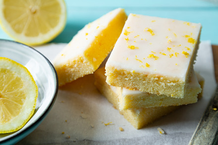Lemon brownies or lemonies with lemon glaze and zest